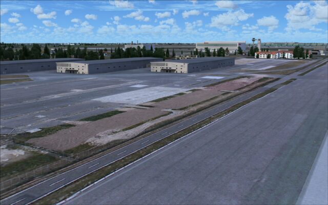 Buildings near end of runway 07R