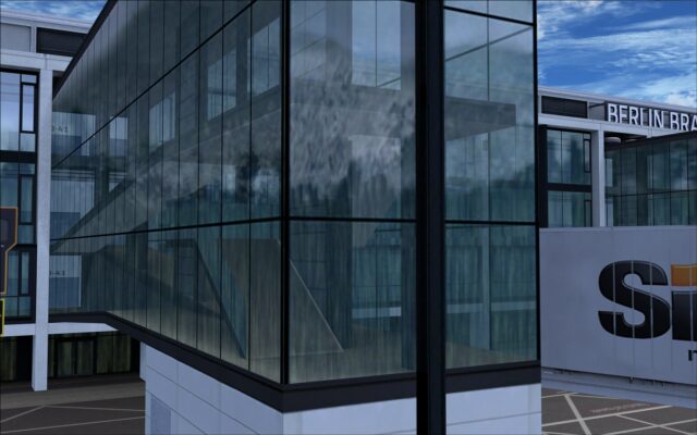 Glass enclosed passenger bridge to jet way