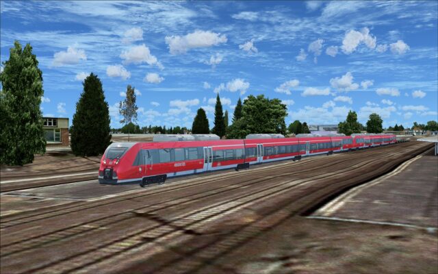 One of several trains that pass by the airport